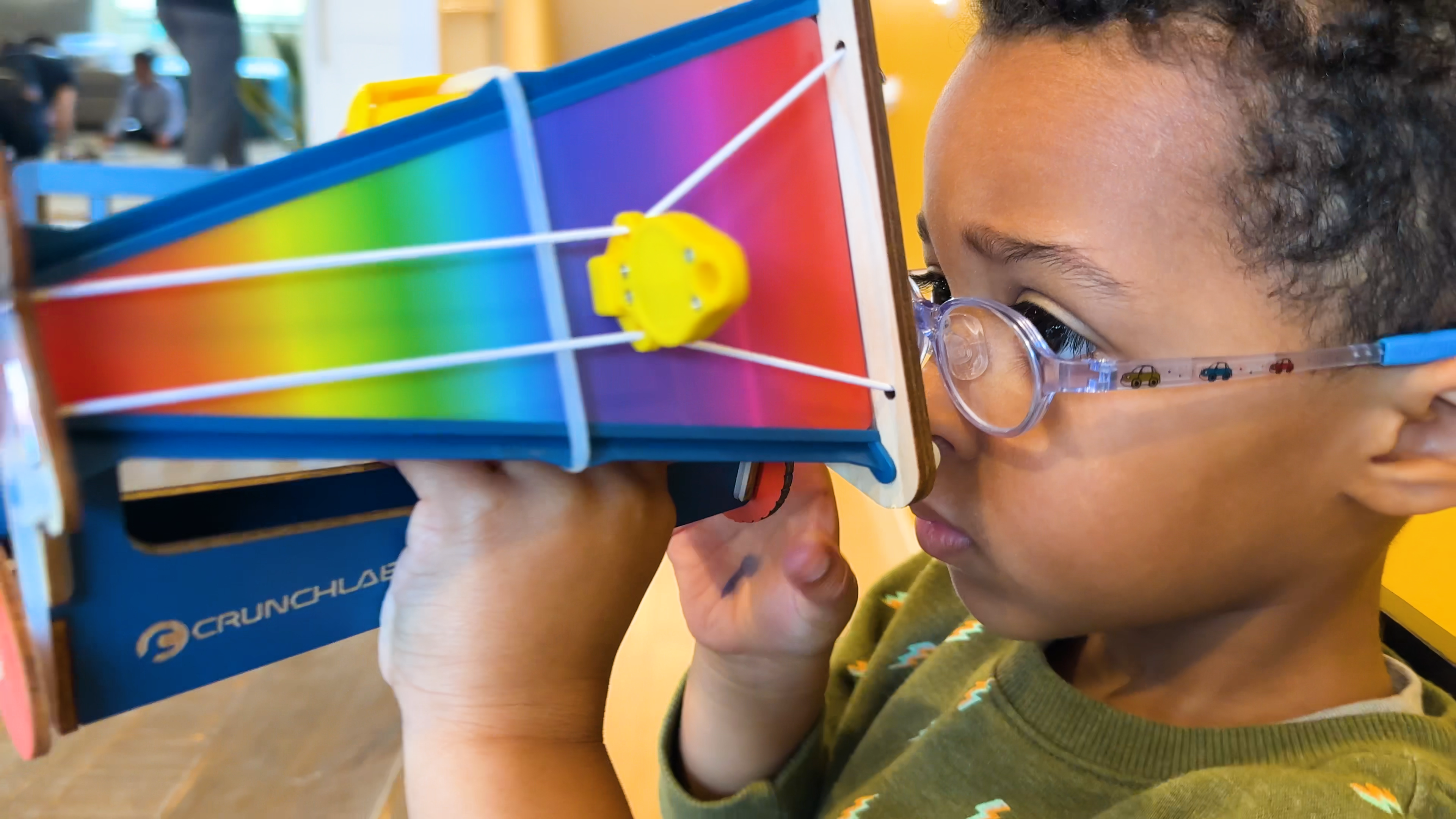 Photo of a Boy Playing with His Build Box