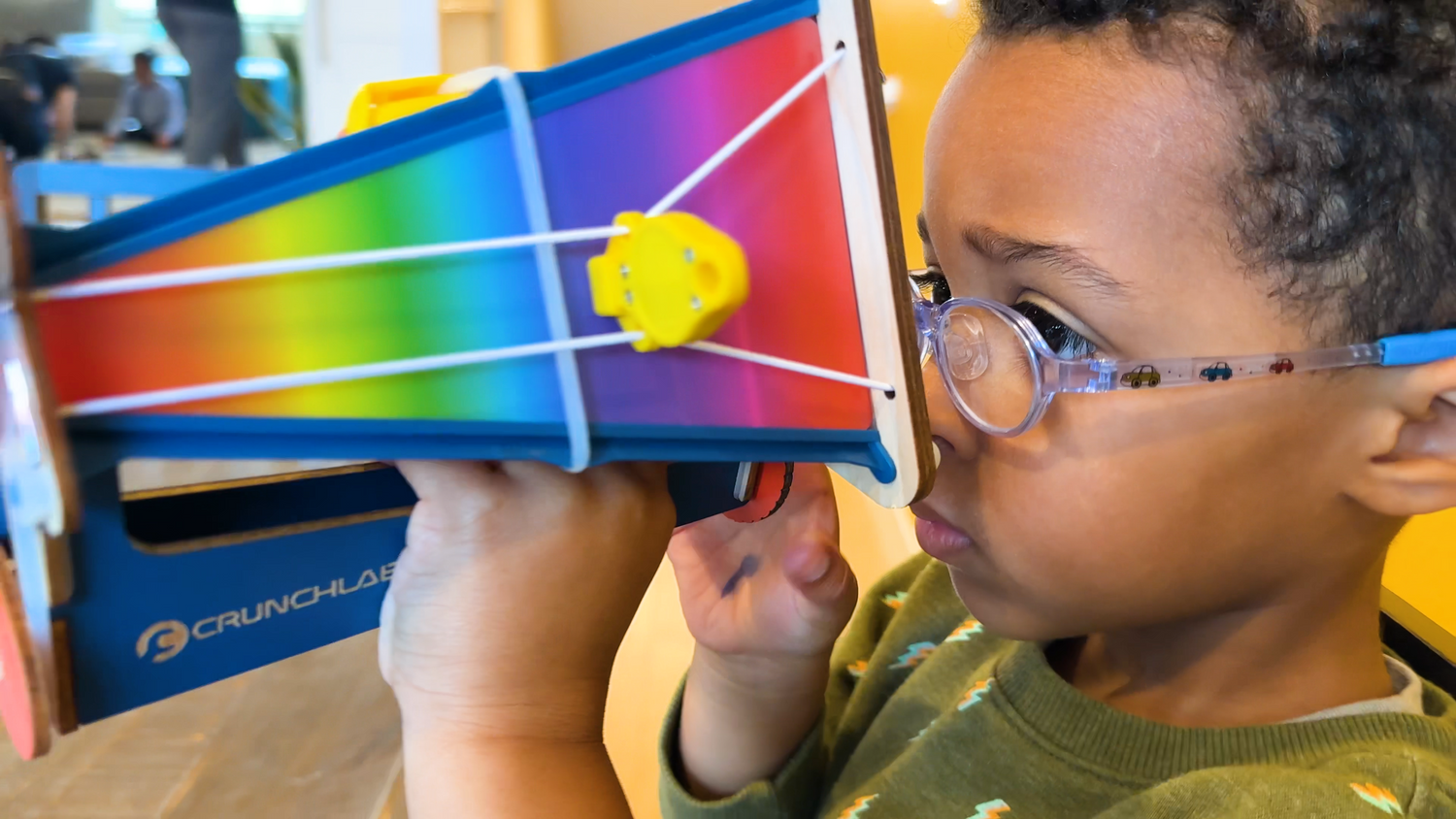Photo of a Boy Playing with His Build Box