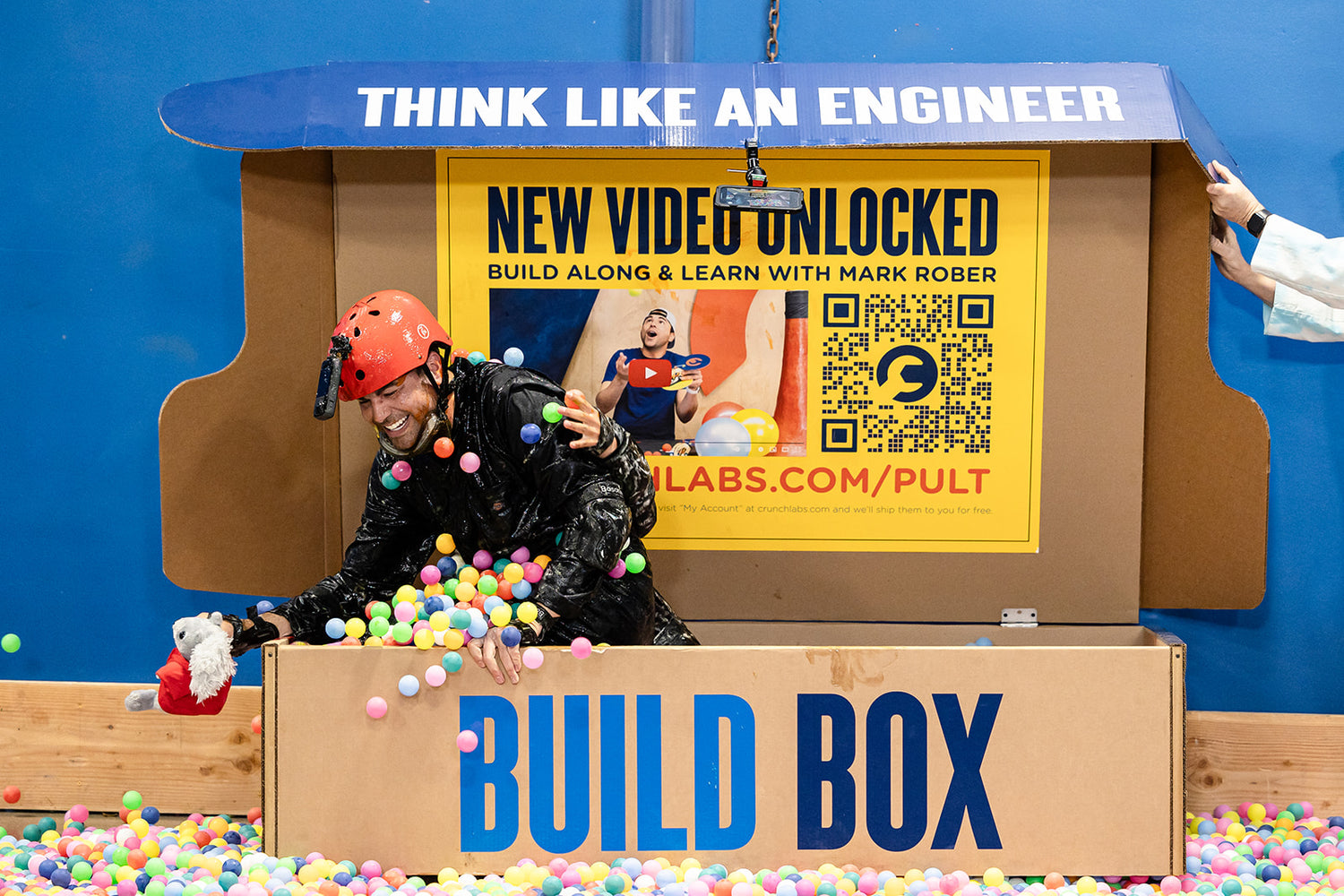 Mark Jumping Out of a Giant Build Box